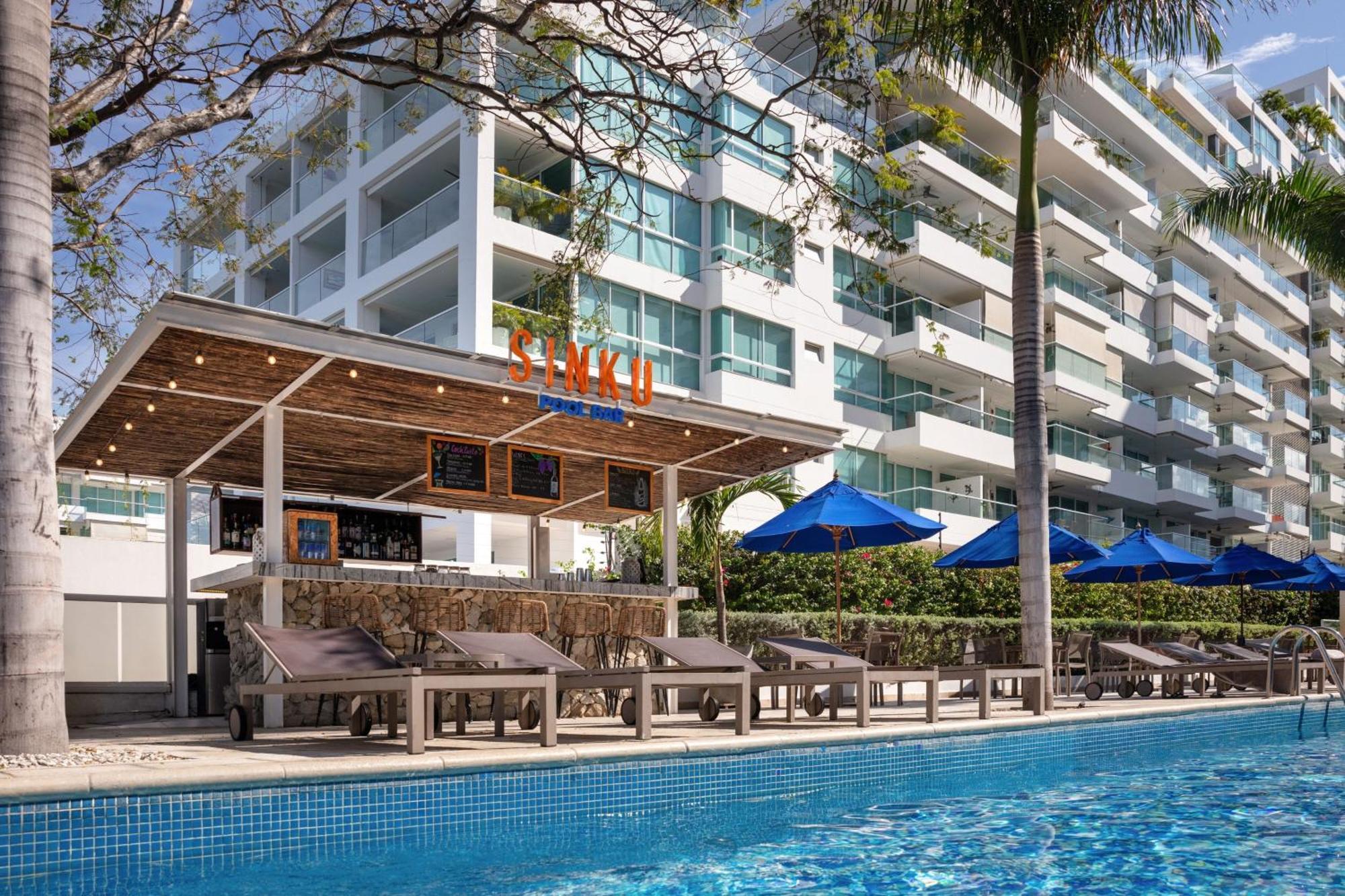Santa Marta Marriott Resort Playa Dormida Extérieur photo The swimming pool at the hotel